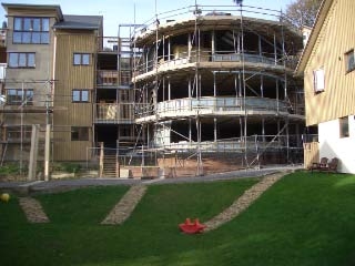  common house covered in scaffolding